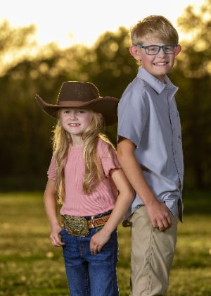 Brother and sister in western wear
