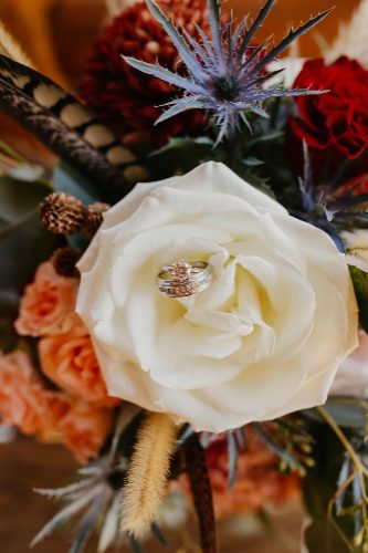 Bridal bouquet with white rose and wildflowers