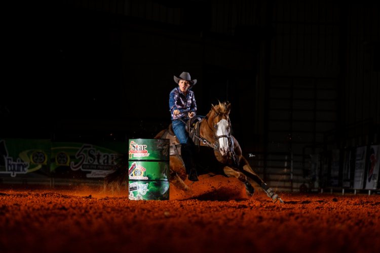 Barrel racing photo by Taylor McClain
