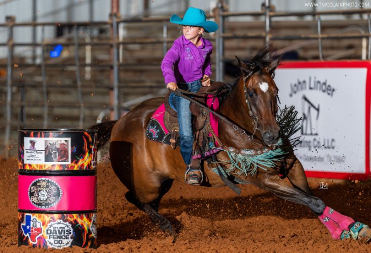 Barrel racing photo by Taylor McClain
